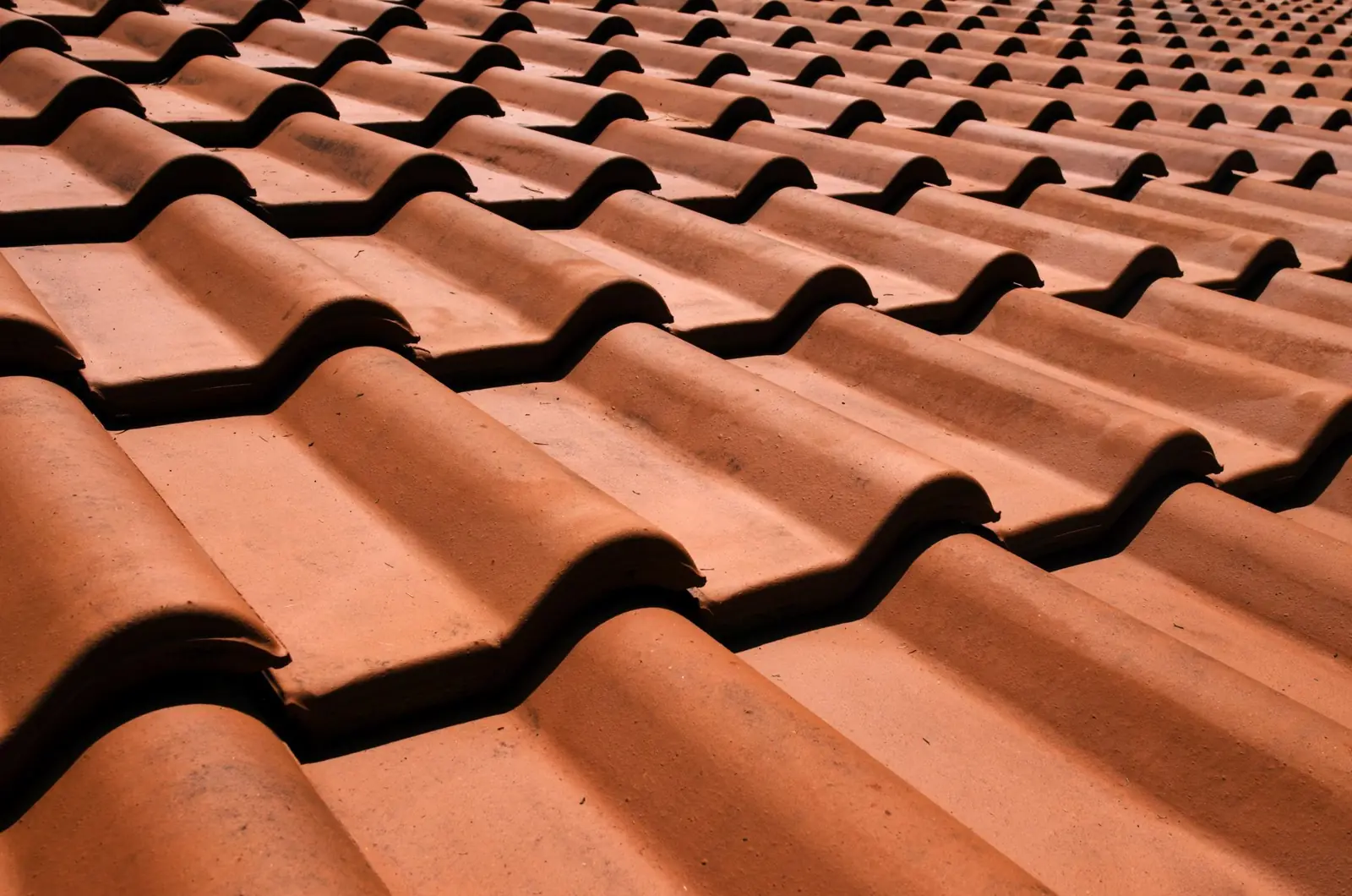 Terracotta-colored concrete roof tiles